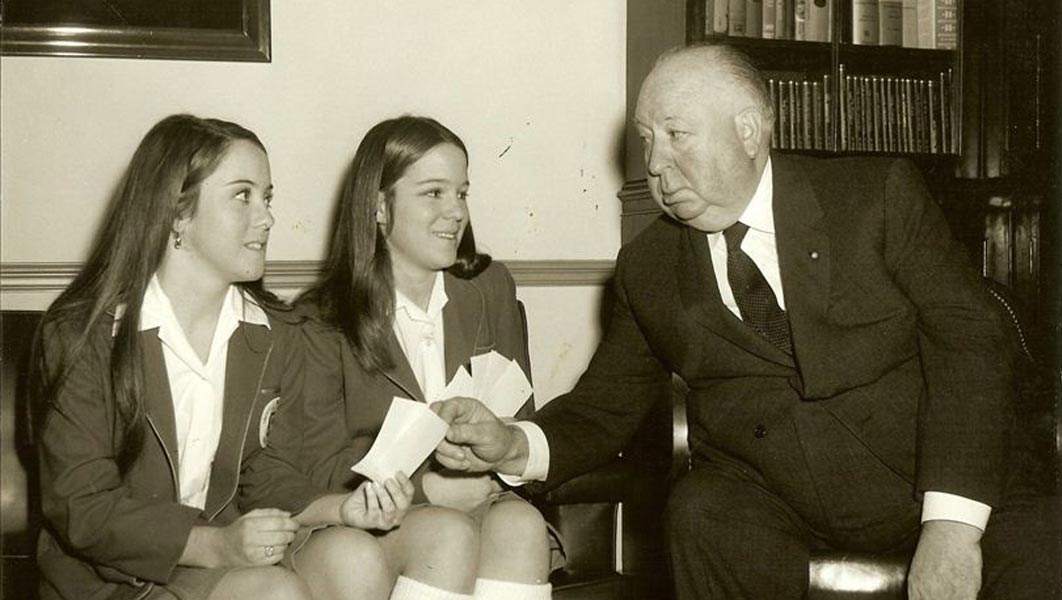Alfred Hitchcock pictured with his granddaughters, Tere Carrubba and Mary Stone.
